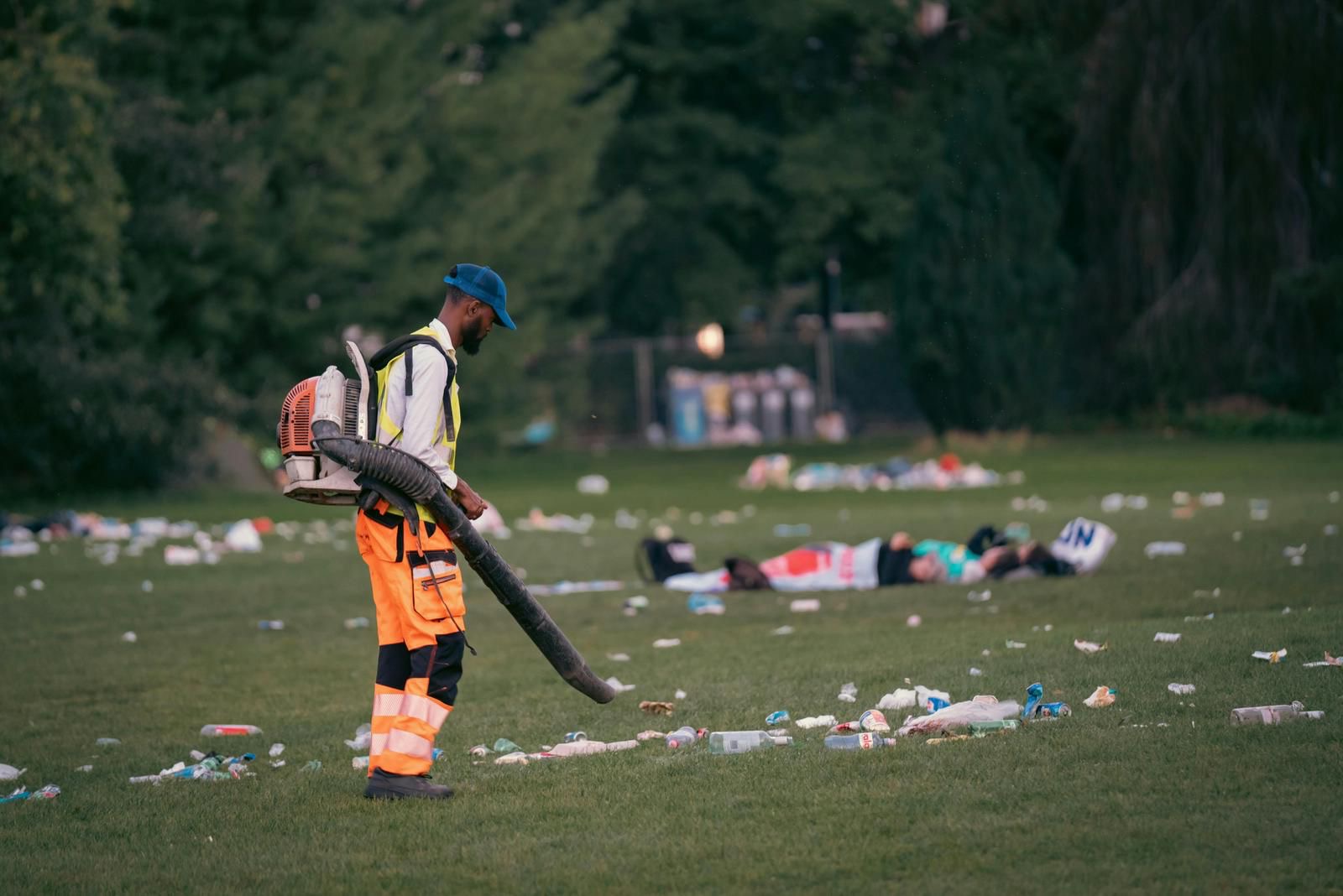 Grounds cleaning crew tidying outdoor venue